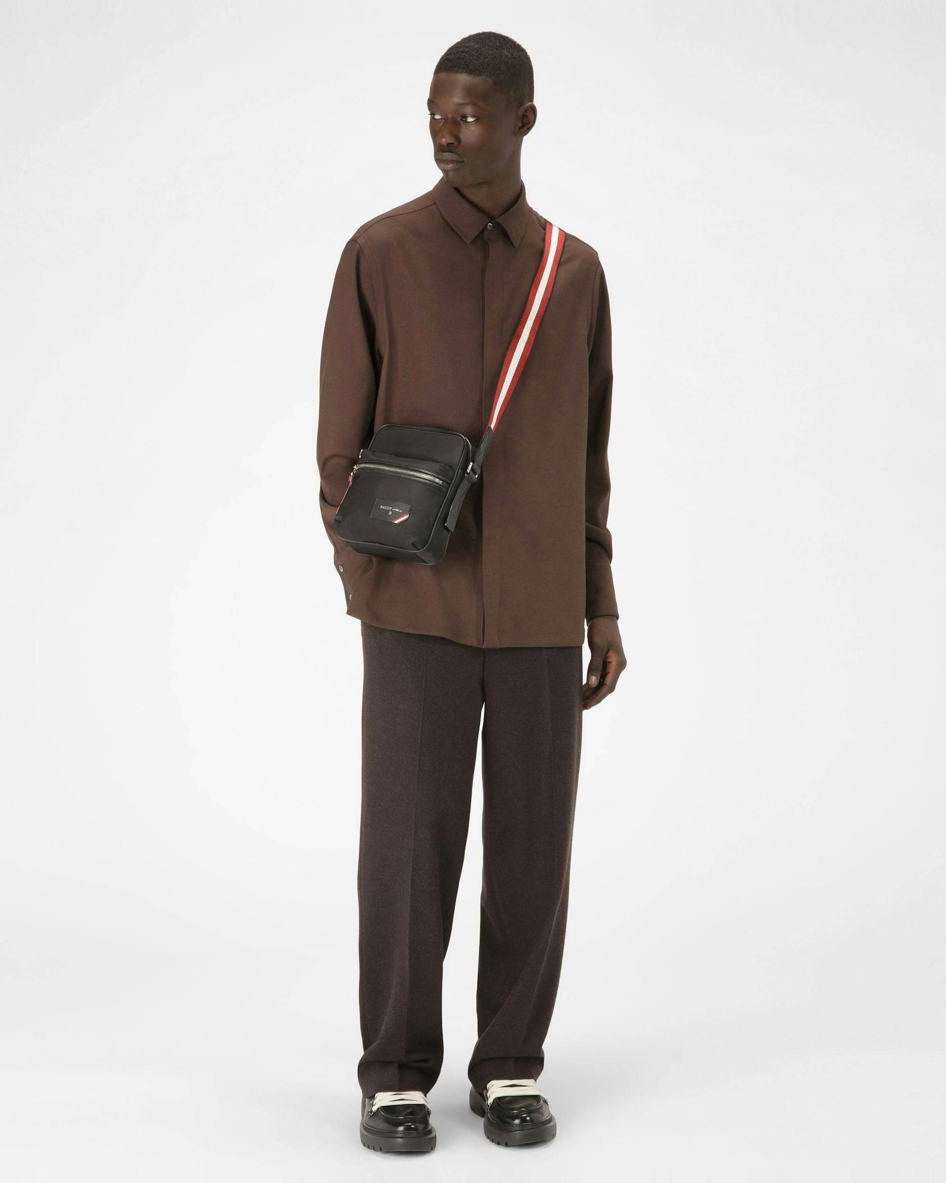 Men's Explore Crossbody Bag In Black Leather And Nylon | Bally | On Model Front