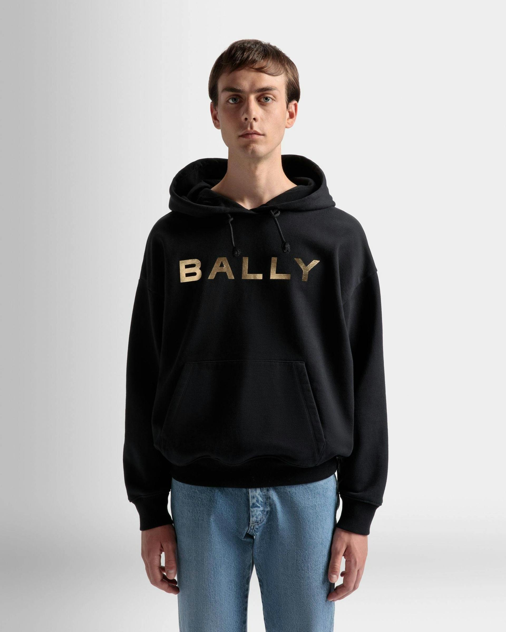 Men's Logo Hooded Sweatshirt In Black Cotton | Bally | On Model Close Up