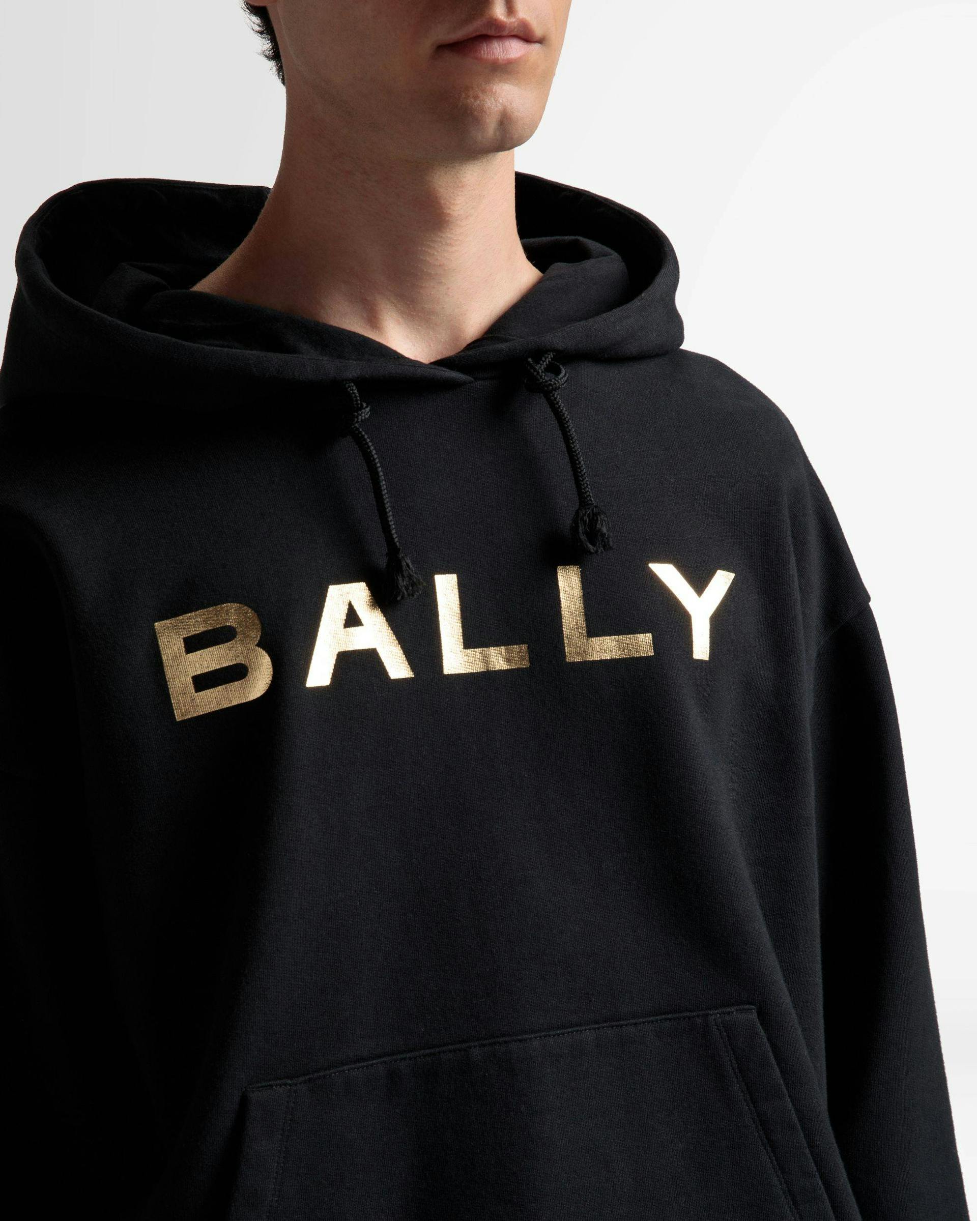 Men's Logo Hooded Sweatshirt In Black Cotton | Bally | On Model Detail