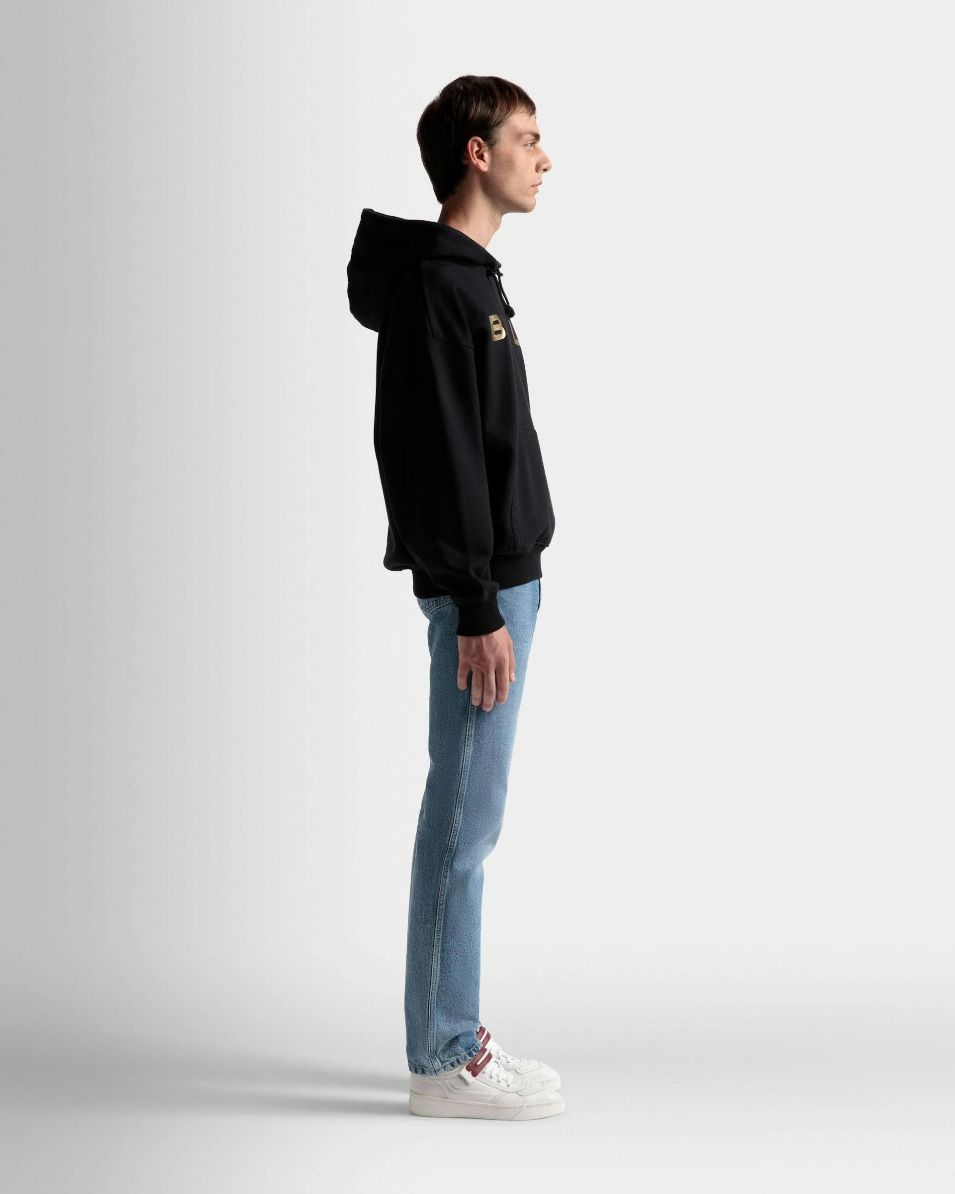 Men's Logo Hooded Sweatshirt In Black Cotton | Bally | On Model 3/4 Front