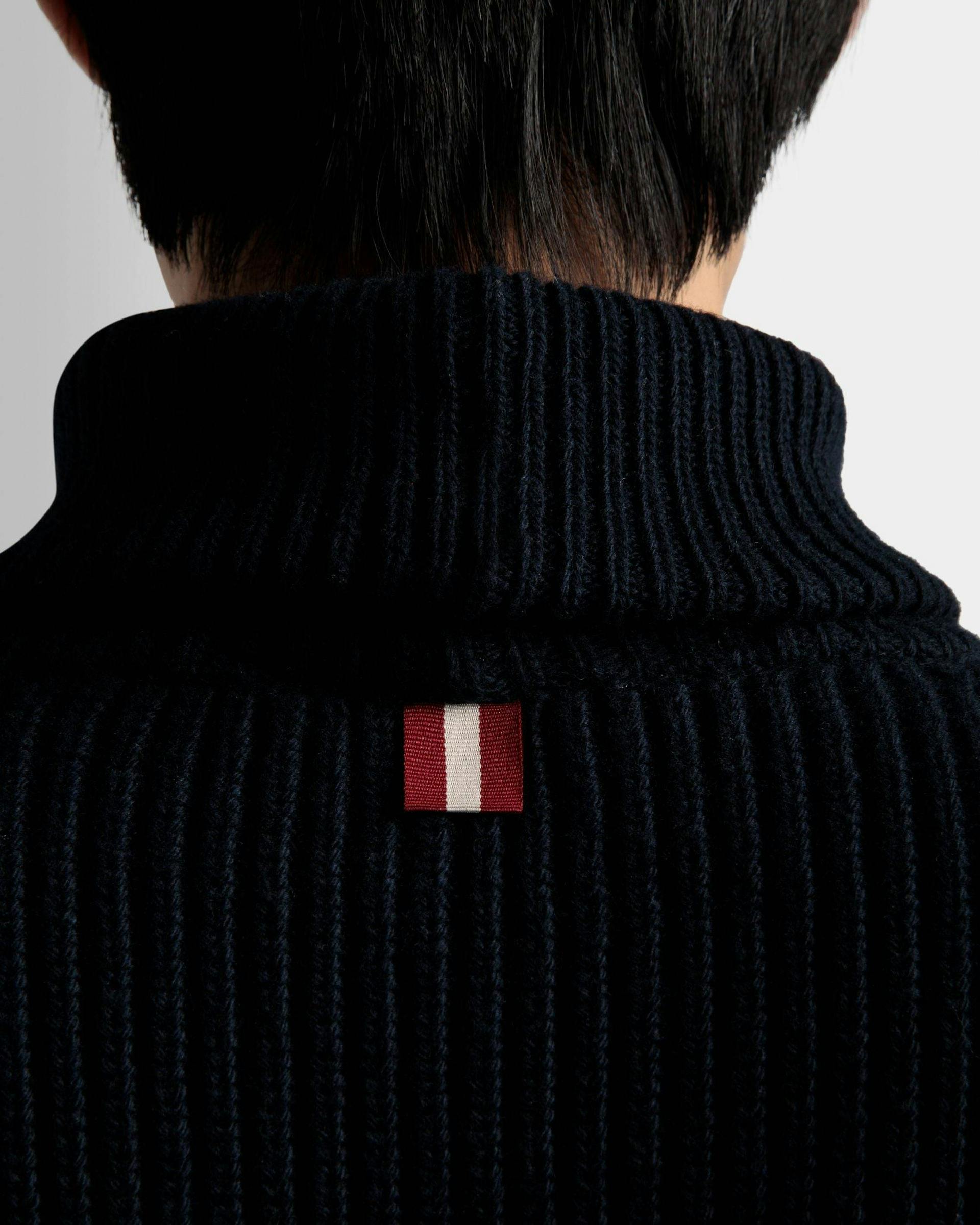 Men's Turtleneck Sweater In Dark Blue Wool | Bally | On Model Detail