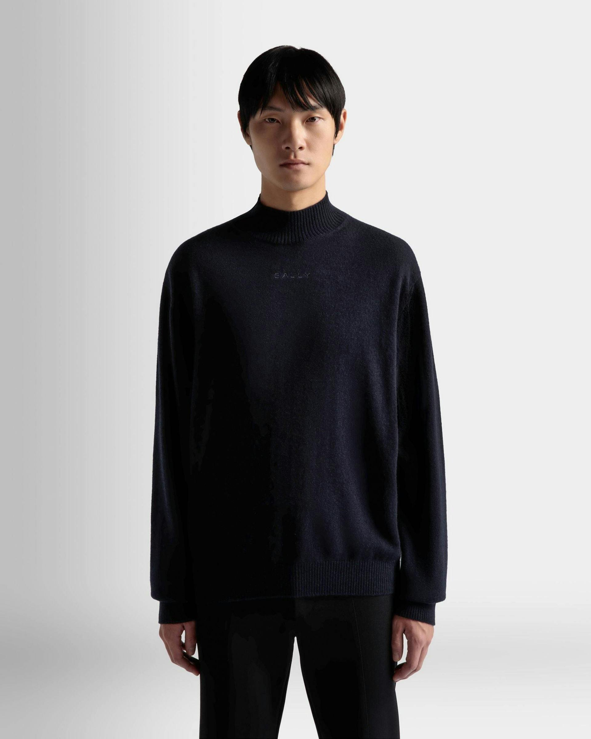 Men's Turtleneck Sweater In Dark Blue Cashmere | Bally | On Model Close Up