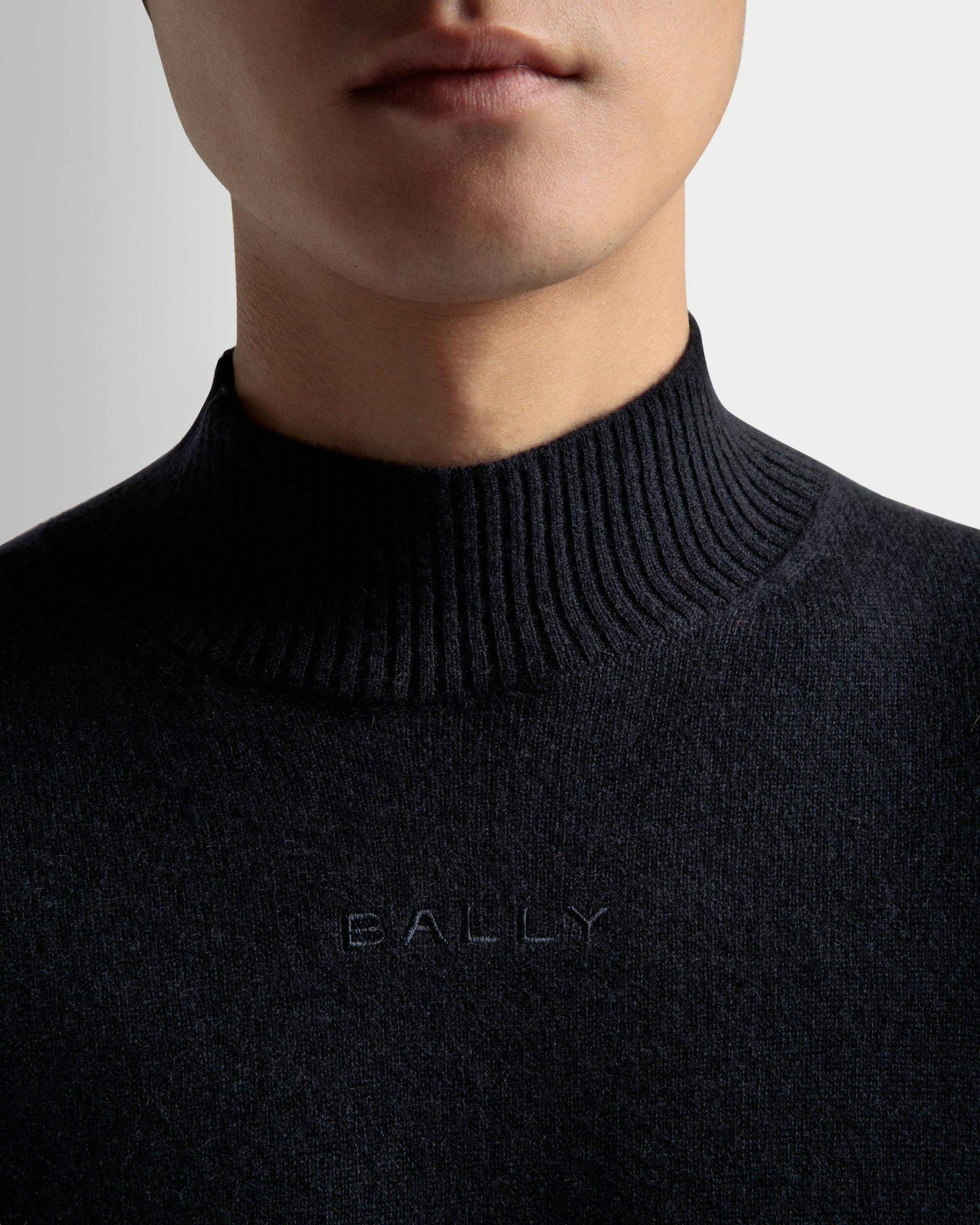 Men's Turtleneck Sweater In Dark Blue Cashmere | Bally | On Model Detail