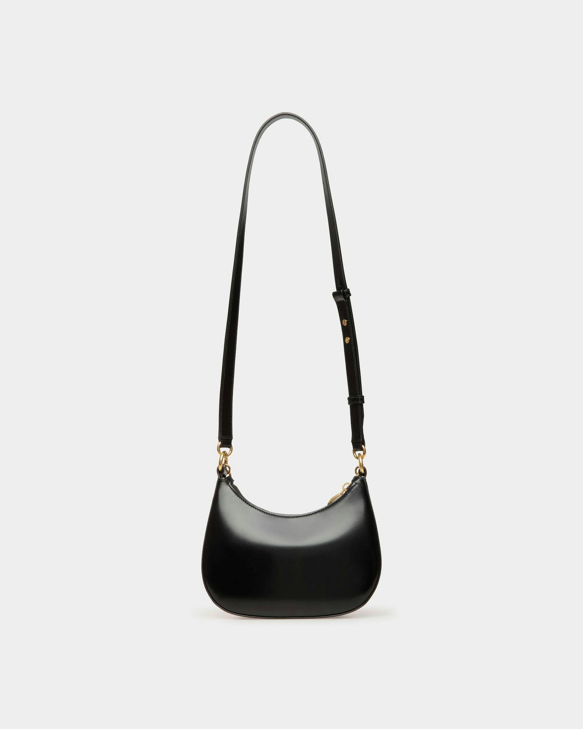 Women's Emblem Mini Crossbody Bag in Black Patent Leather | Bally | Still Life Back