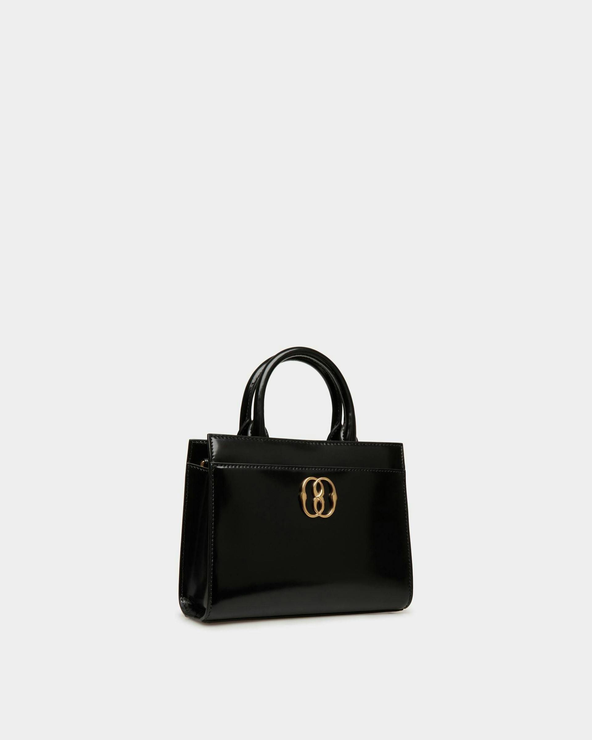 Women's Emblem Small Tote Bag In Black Patent Leather | Bally | Still Life 3/4 Front