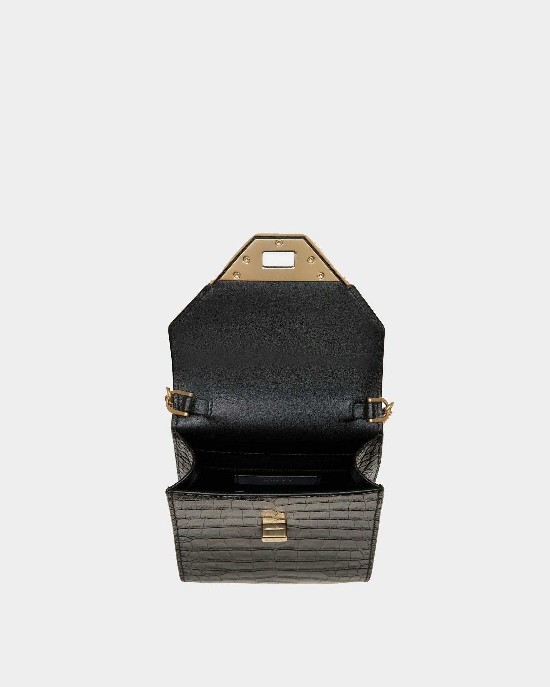 Women's Tilt Phone Bag in Black Crocodile Print Leather | Bally | Still Life Open / Inside