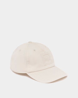 Baseball Hat in Ivory Cotton With a Debossed Logo